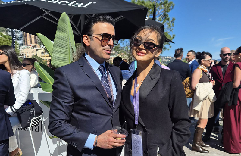 Dr Bilal Malik networking with professional at outdoor AMWC Monaco event